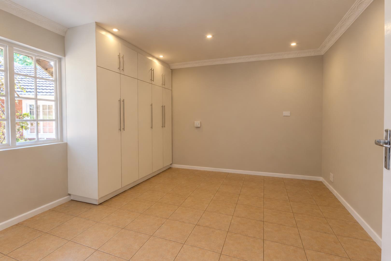 769780_Refined_Neutral_Room_with_Flush_Downlights.png